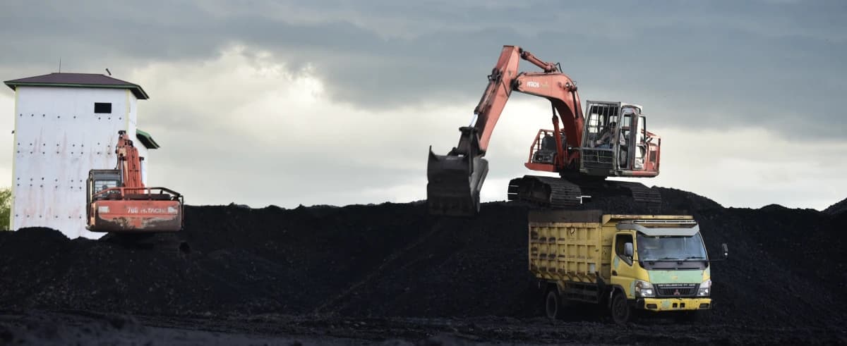 Mining operations with excavators and trucks